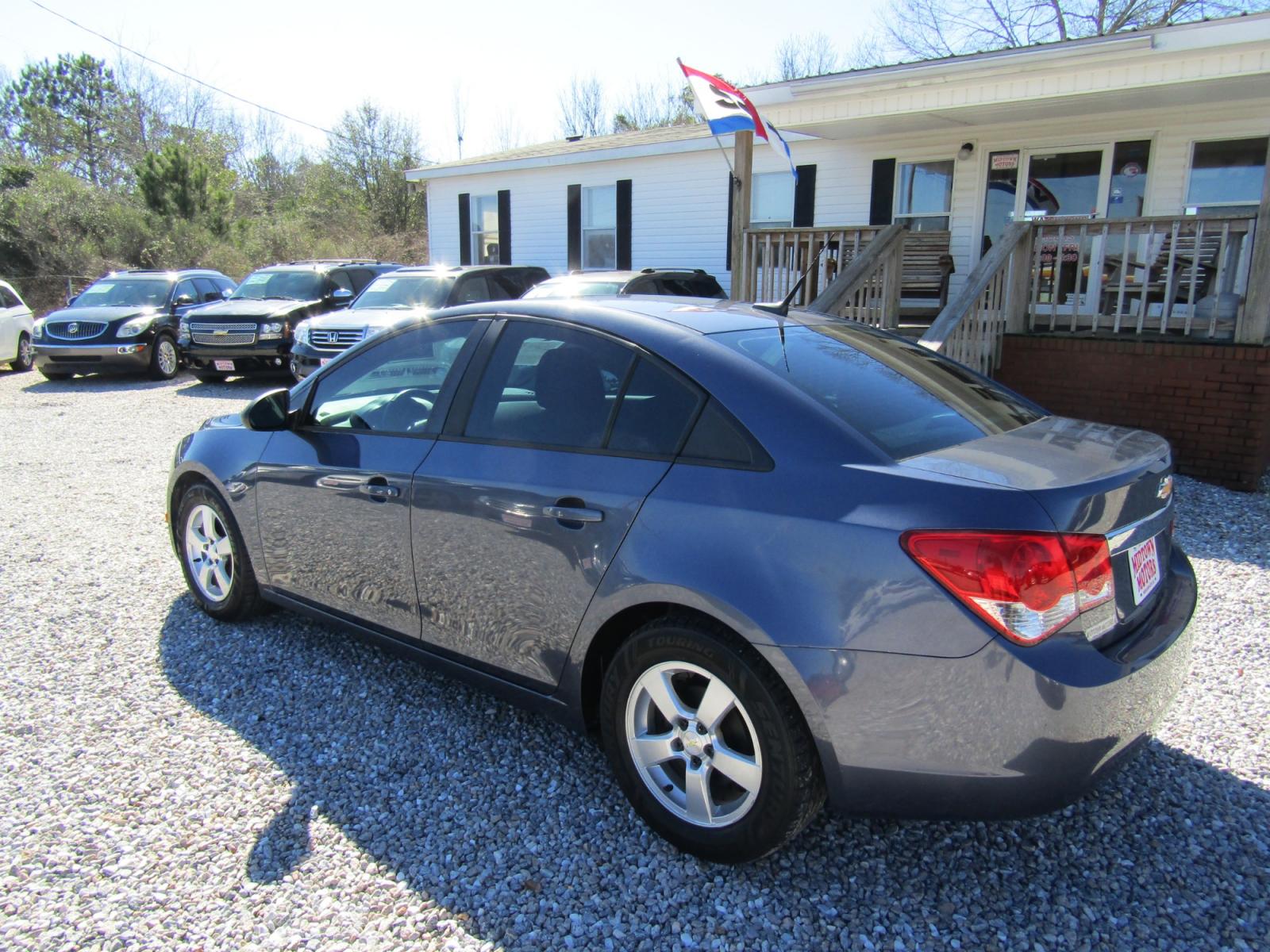2014 Blue Chevrolet Cruze LS Auto (1G1PA5SH4E7) with an 1.8L L4 DOHC 16V FFV engine, Automatic transmission, located at 15016 S Hwy 231, Midland City, AL, 36350, (334) 983-3001, 31.306210, -85.495277 - Photo #5